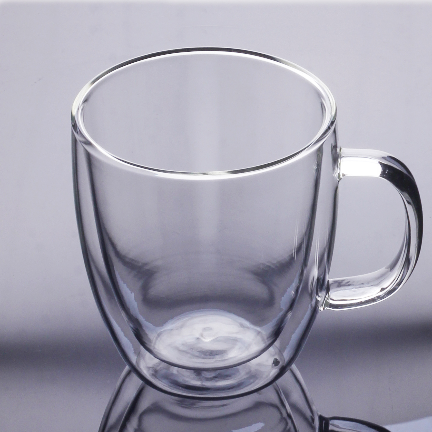 Double wall glass mug with handle